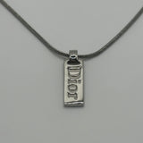 DIOR SILVER SPELLOUT PLATE NECKLACE