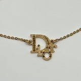 DIOR CRYSTAL WORD LOGO BRACELET GOLD