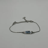 DIOR BLUE SPELLOUT SILVER PLATE BRACELET