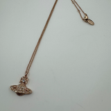 VIVIENNE WESTWOOD ROSE GOLD CRYSTAL SATURN NECKLACE
